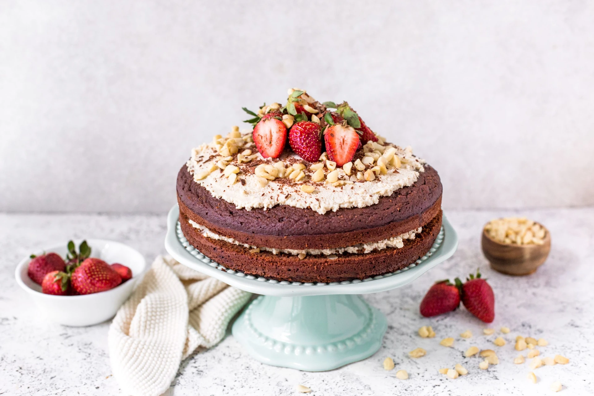 Gluten free chocolate macadamia cake with macadamia maple cream